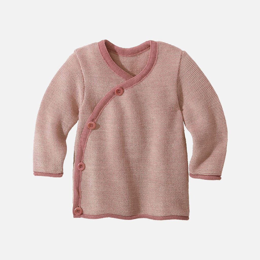 A pink Disana Melange Jacket for babies, featuring a wrap closure and tagua nut buttons.