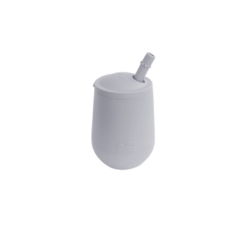 EZPZ Mini Cup and Straw Training System packaging, showing a gray silicone mini cup with a straw.