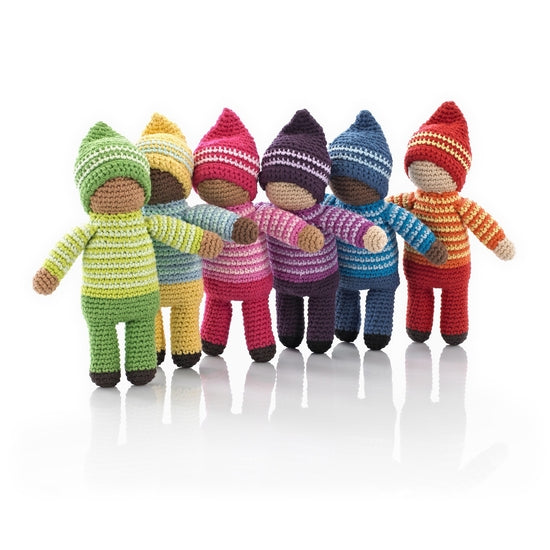 A collection of colorful, handcrafted pixie rattle toys, featuring different colors and patterns, designed for babies.