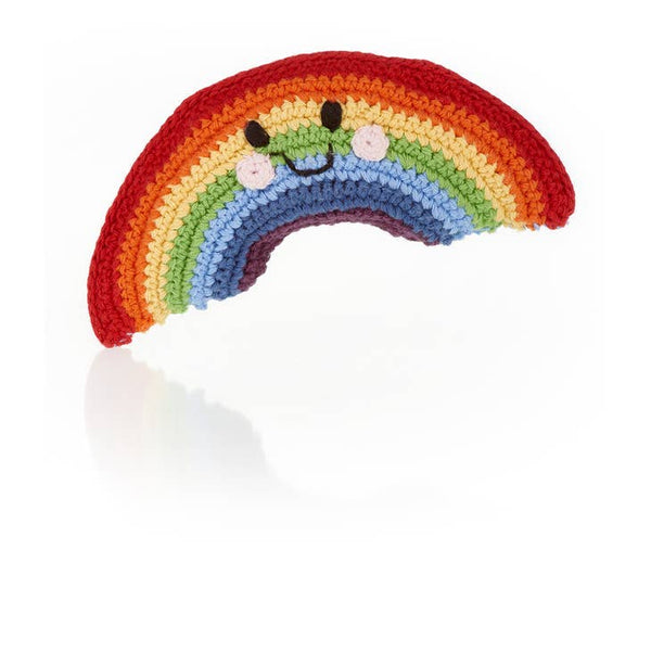 rainbow yarn baby toy on a white background