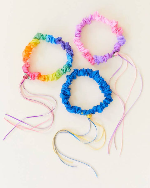 three silk garlands with ribbons on a white background 